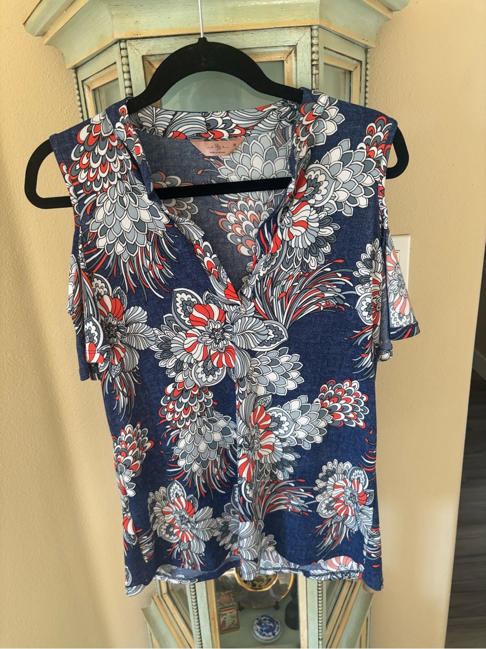 Top - Navy, orange, White Floral Print. Peek a boo shoulders